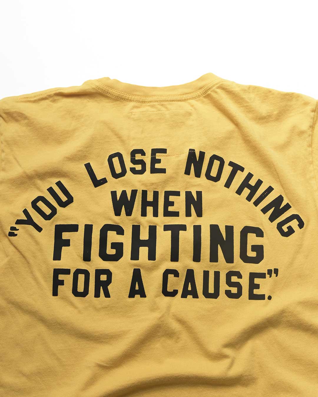 Ali 'You Lose Nothing' Gold Tee