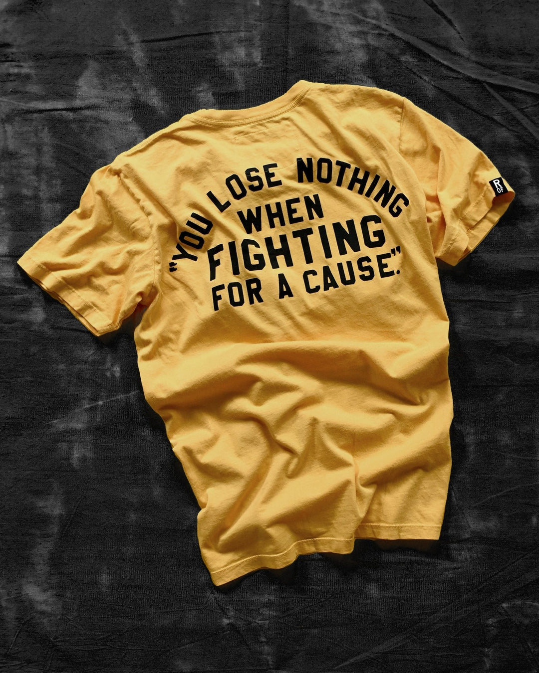 Ali 'You Lose Nothing' Gold Tee