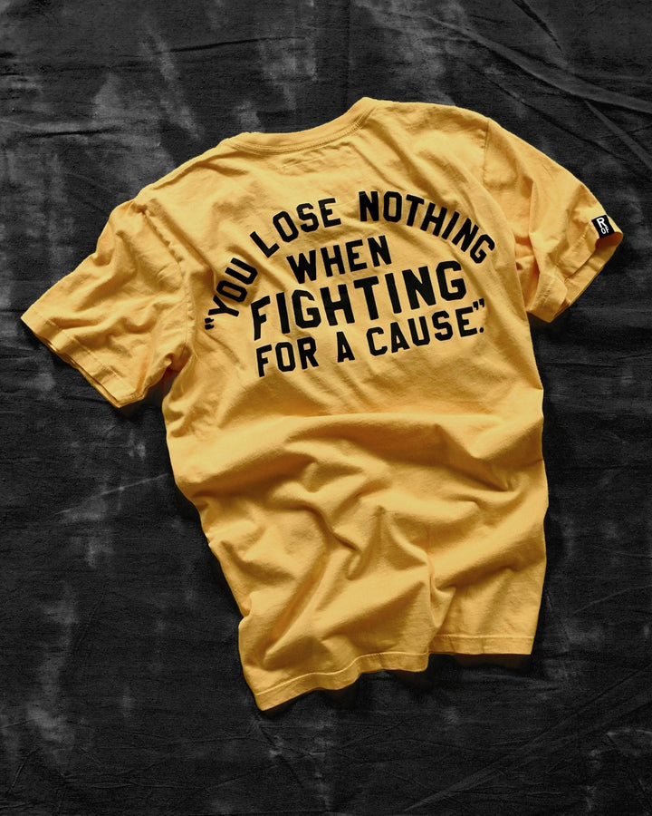 Ali 'You Lose Nothing' Gold Tee