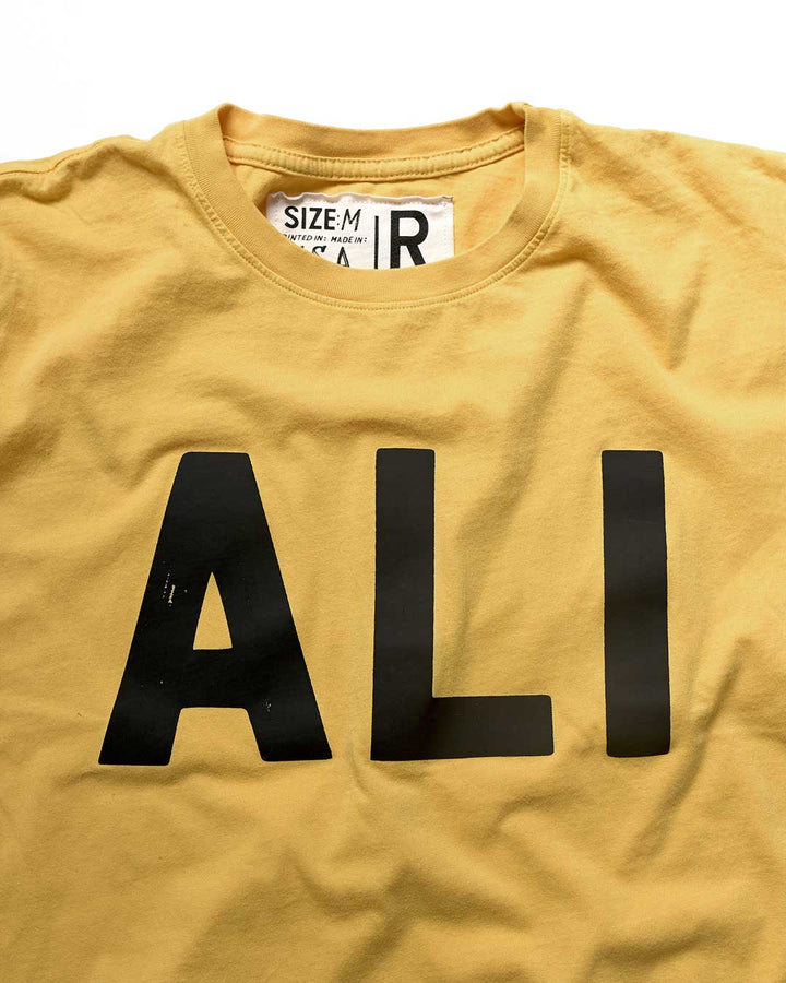 Ali 'You Lose Nothing' Gold Tee